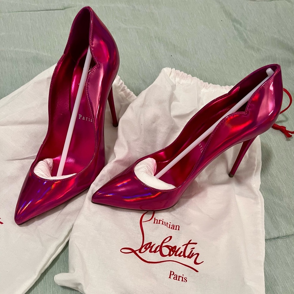 Absolutely gorgeous Christian Louboutin hot chick hot pink heels.